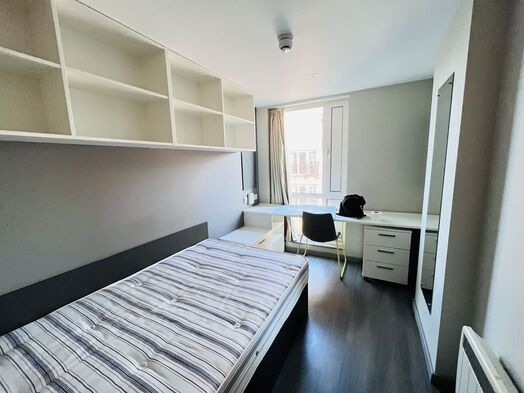 Photo of a ensuite room in a student hall in London.