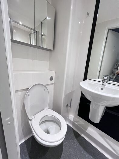 Photo of a ensuite room in a student hall in London.