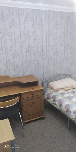 Photo of a package of 2 single rooms with bathroom.