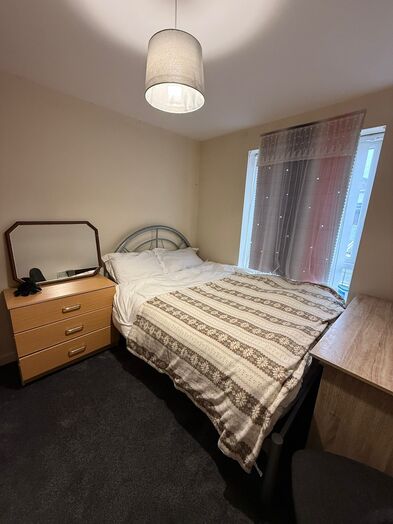 Photo of a double-bed room in a 2-bedroom flat in Newcastle-under-Lyme.