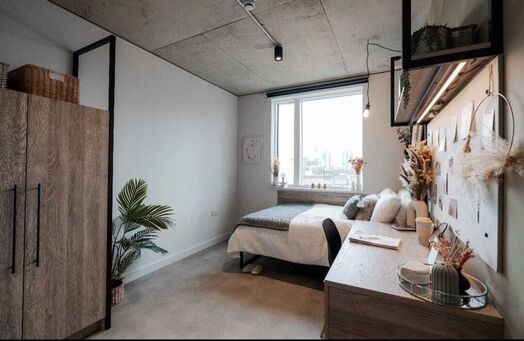 Photo of a ensuite room in a student hall in London.