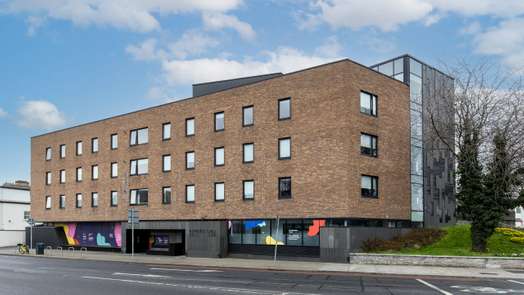 Photo of a broadstone Hall.