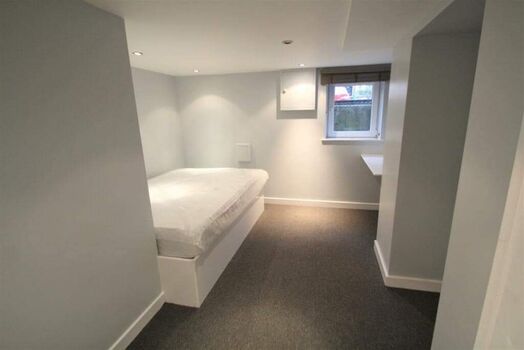 Photo of a room in a 4-bedroom house in Leeds.